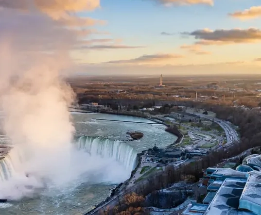 Stunning view of Niagara Falls from the Canadian side with the iconic Fallsview Casino Resort in the background