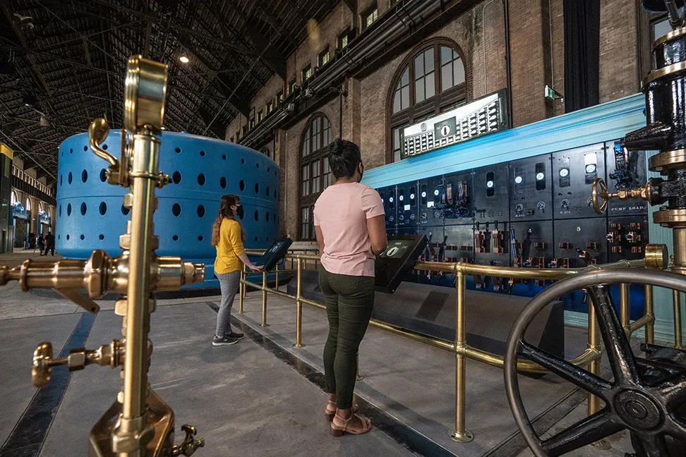 Tourists learning about the historic power generation exhibits at Niagara Parks Power Station