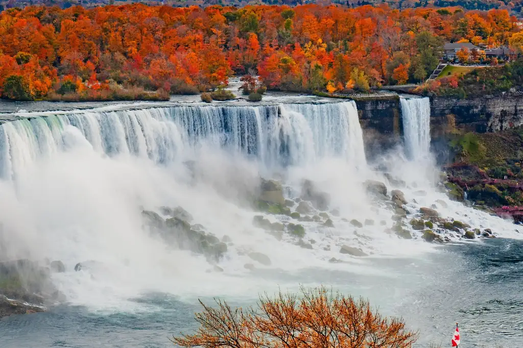 American Falls at Niagara Falls framed by vibrant autumn foliage