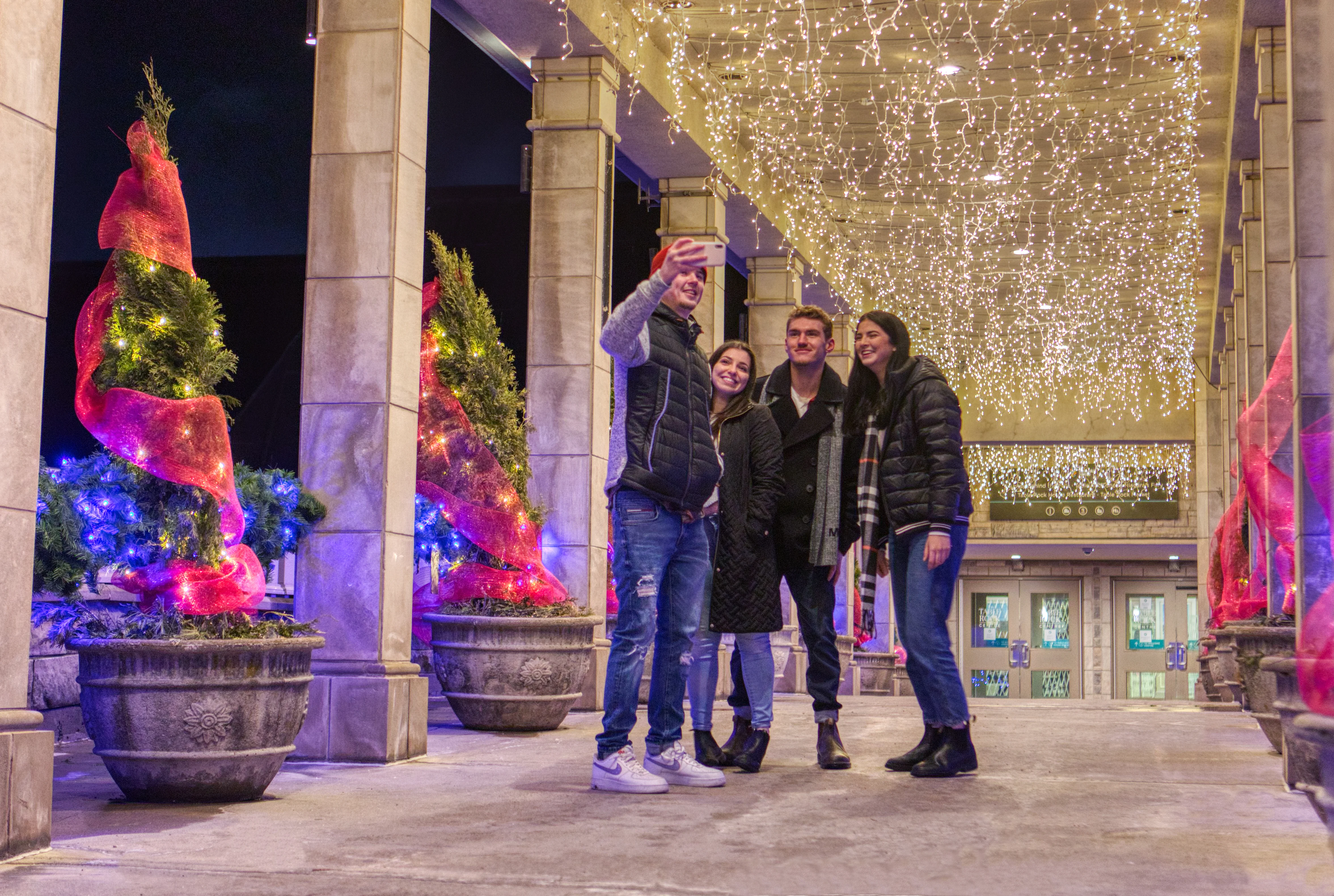 Group of friends at Winter Festival of Lights enjoying the experience