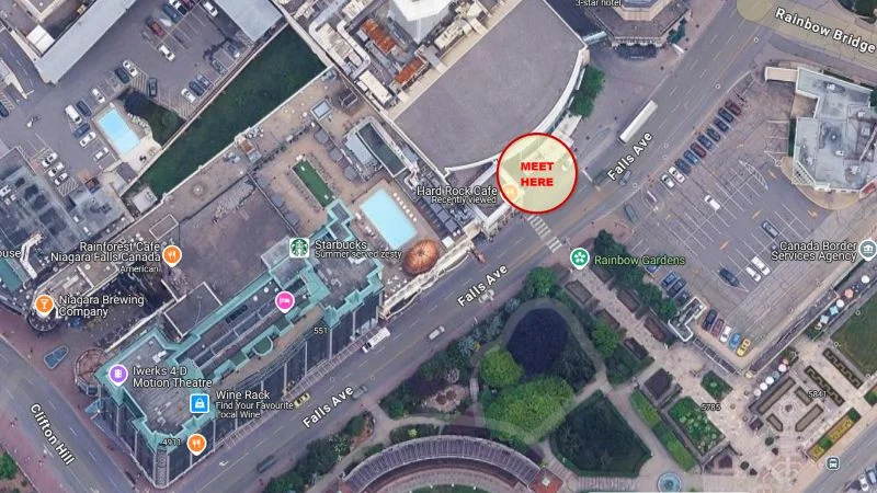 Aerial overhead view of sidewalk meeting point and pickup location showing the building layout and surrounding area for easy navigation